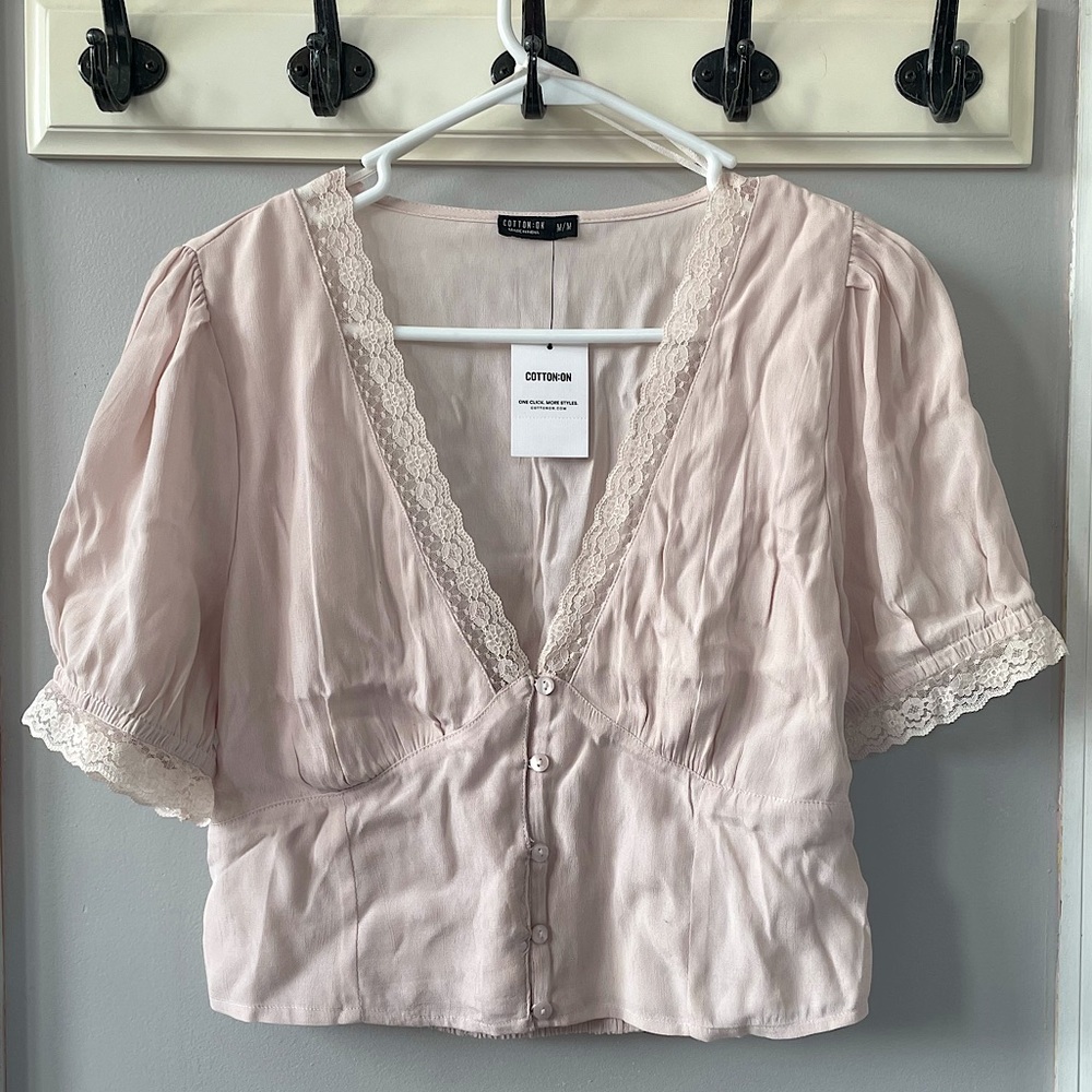 cream/baby pink blouse